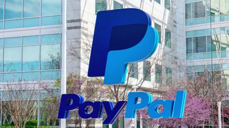 PayPal headquarters building with large PayPal logo sign in front, located in San Jose, California.