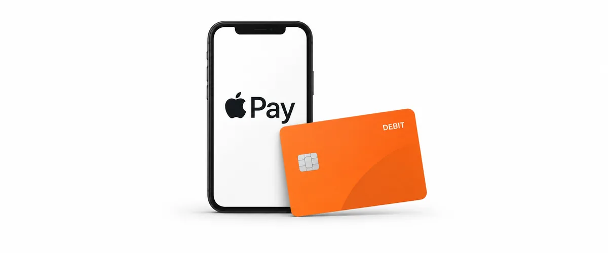 Apple Pay on a smartphone beside an orange debit card